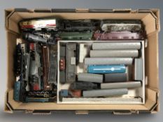 A quantity of die cast locomotives, carriages and other rolling stock.