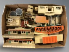 A group of tin plate model railway building models.