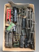 A group of tin plate rolling stock, track, etc.