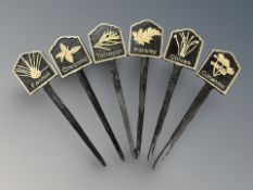 Six cast iron garden herb spike signs, length 26 cm.