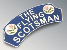 A cast iron Flying Scotsman plaque, width 39 cm.