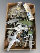 A group of die cast scale model aircraft.