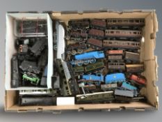 A quantity of die cast locomotives, carriages and other rolling stock.