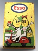 An enameled metal Esso sign, 30 cm x 20 cm.
