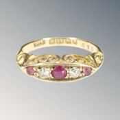 An 18ct gold ruby and diamond ring, size K CONDITION REPORT: 3.