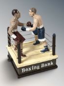 A novelty cast iron boxing money bank, height 21 cm.