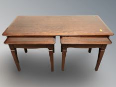 A reproduction nest of three tables,