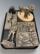 A group of Robert Olley mining figures and plaques.