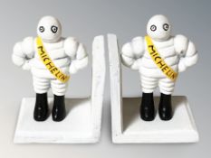 A pair of cast iron Michelin man bookends, height 13 cm.