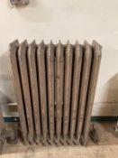 An early 20th century cast iron radiator height 99 cm x depth 23 cm x width 67 cm *Provenance -