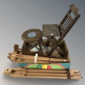 A small folding child's chair, an oak stool, folding easels,