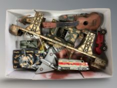 A tin plate model railway bridge, die cast models including tanks, aircraft, toys, etc.