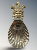 An Elizabeth II silver-gilt caddy spoon with Prince of Wales plume handle, Roberts & Belk,