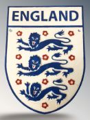 A cast iron England crest, length 31 cm.