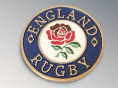 A cast iron England Rugby plaque, diameter 24 cm.