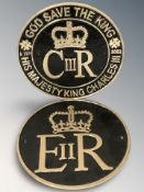 Two cast iron EIIR and CIIIR plaques, each 24 cm diameter.