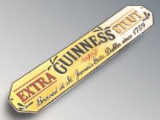 A cast iron Guinness plaque, width 56 cm.