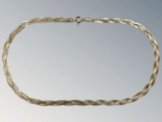 A yellow 9ct gold two-tone flat link necklace, length 36 cm CONDITION REPORT: 6.