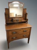 An Art Nouveau mirror backed dressing chest,