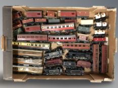 A quantity of die cast locomotives, carriages and other rolling stock.