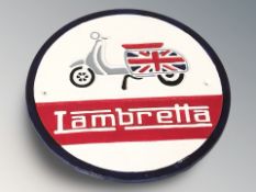A cast iron Lambretta plaque, diameter 30 cm.