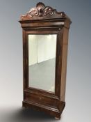 A French mahogany mirror door armoire with shelved interior, 106 cm W x 51 cm D x 231 cm H.
