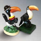 Two cast iron toucan figures, height 16 cm.