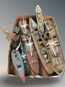 A group of scale model boats.