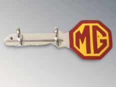 A cast metal MG key rack, length 30 cm.