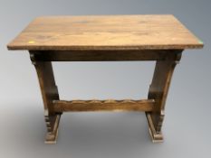 A reproduction oak refectory occasional table, 88 cm x 45 cm x 76 cm.
