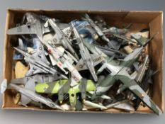 A group of die cast scale model aircraft.