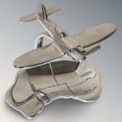 An aluminium model of a plane, height 15 cm.