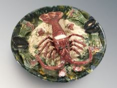 A Palissy style lobster dish, diameter 30 cm.