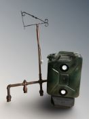 A jerry can light and a further light fitting on bracket in the form of pipes.