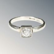 A platinum diamond solitaire ring, size M CONDITION REPORT: 3.