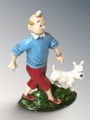 A cast iron Tintin doorstop, height 33 cm.