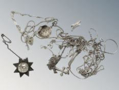 A group of sterling silver and white metal jewellery to include silver chains with crucifix