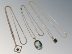 Three 9ct gold pendants on chains CONDITION REPORT: 14.