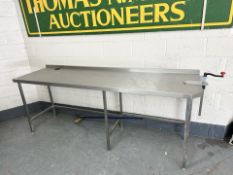 A stainless steel prep table.