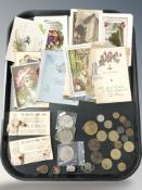 A group of antiquarian postcards, various coins, crowns, miniature dolls house jars, badges,