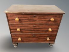 A Victorian beech three drawer chest,
