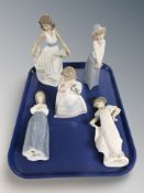 Five Nao figures of children.