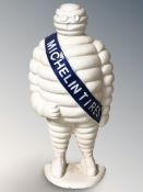 A cast iron Michelin man doorstop, height 54 cm.