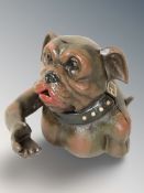 A cast iron dog money bank, height 15 cm.
