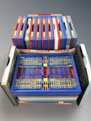 A quantity of plastic collapsible storage crates.