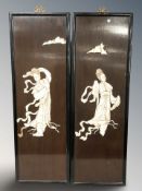 A pair of early 20th century bone inlaid Japanese panels depicting Geisha,