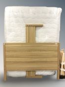A John Lewis oak effect 4ft6 bedframe with mattress.