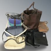 A quantity of leather handbags.