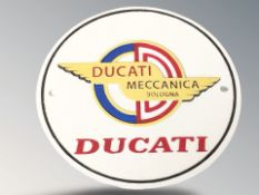A cast iron Ducati plaque, diameter 25 cm.