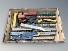 A quantity of die cast locomotives, carriages and other rolling stock.
